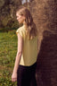 SLEEVELESS SHIRT WITH BEJEWELED BUTTONS