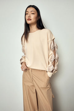 BLOUSE WITH BOWS ON THE SLEEVES
