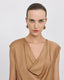 SLEEVELESS TOP WITH A DRAPED NECKLINE