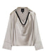 BLOUSE WITH A DRAPED NECKLINE AND RHINESTONES