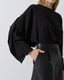 BLOUSE WITH RUFFLES AT THE BACK