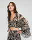 PRINTED WRAP TOP WITH RUFFLES