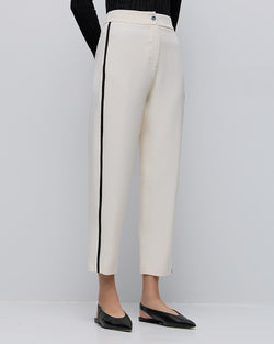 PANTS WITH PIPING DETAILS