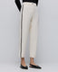 PANTS WITH PIPING DETAILS