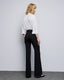 FLARE PANTS WITH FAUX LEATHER EFFECT PIPING DETAILS