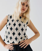 SLEEVELESS TOP WITH EMBROIDERED PATTERN