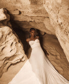 LONG PLEATED DRESS WITH EMBROIDERED TOP
