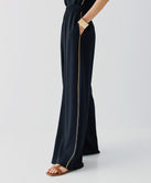 PANTS WITH TWO-TONED DETAILS