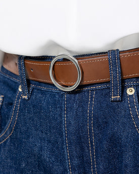 BELT WITH A ROUND BUCKLE