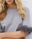 ACCESS FASHION BLOUSE WITH FAUX FEATHER-TRIMMED SLEEVES