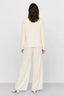 KOCCA JUMPER WITH A CABLE-KNIT PATTERN AND A COLLARED V-NECK - TYEA SWEATER
