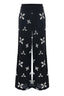 WIDE-LEGGED PATTERNED BLACK TROUSERS - TROUSERS HADEWIN